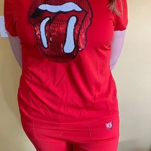 NEW. Matching red top and shorts set.
